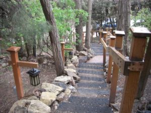 Steps going down to parking lot inside property of 10,000 waves resort and spa