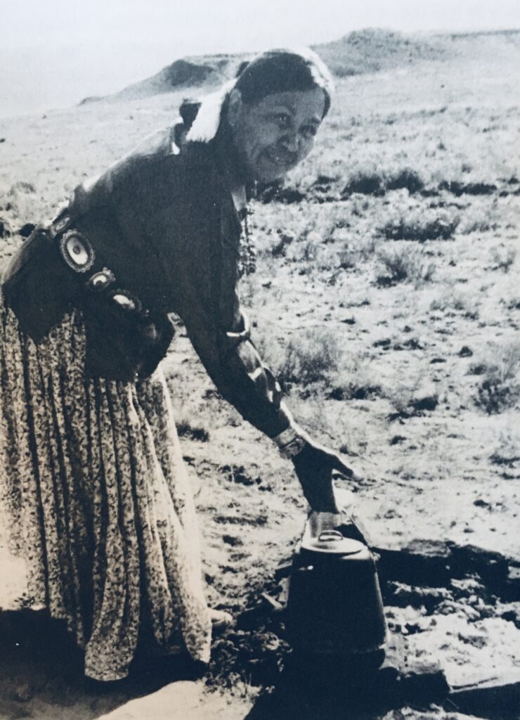 A woman in a dress is standing on the ground