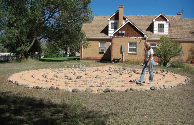 woman walking the Avalon labyrinth in Alamosa, CO