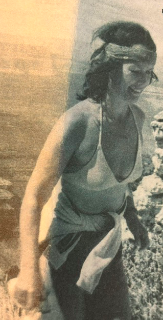 Young lady walking the Grand Canyon rim